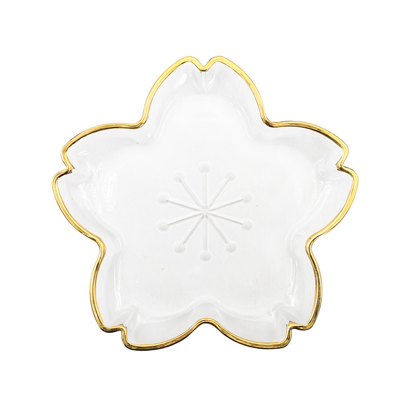 Glass plate with gold rim and petal-shaped design 40